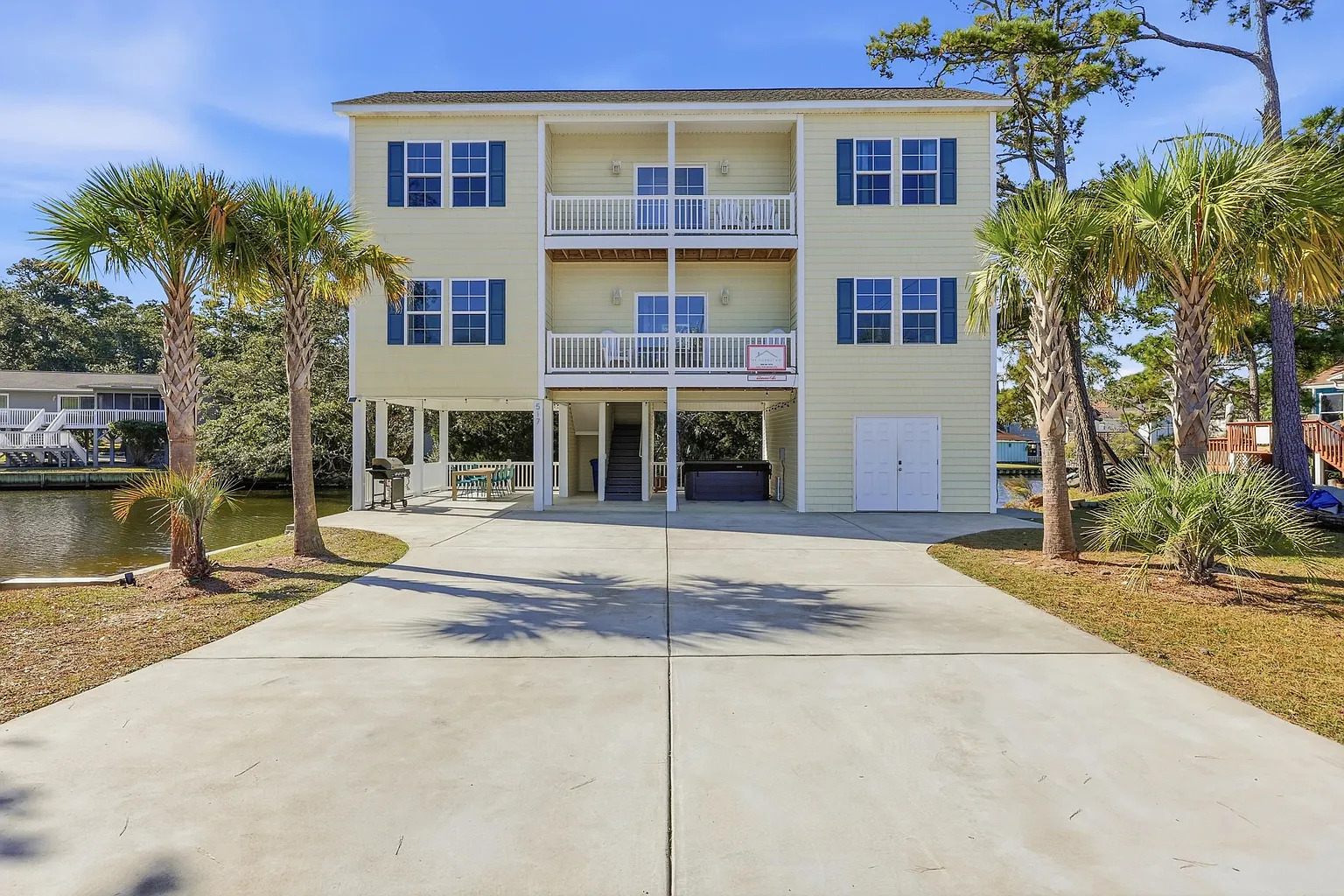 Open-concept living room and kitchen at Banana Villa North Myrtle Beach vacation rental