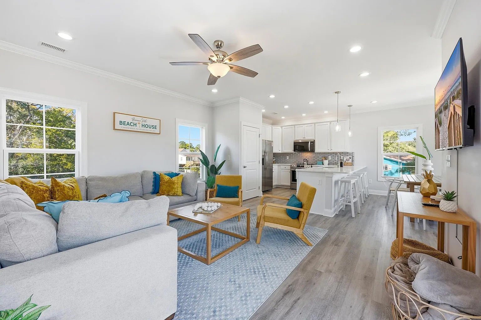 Living room with balcony access at Banana Villa
